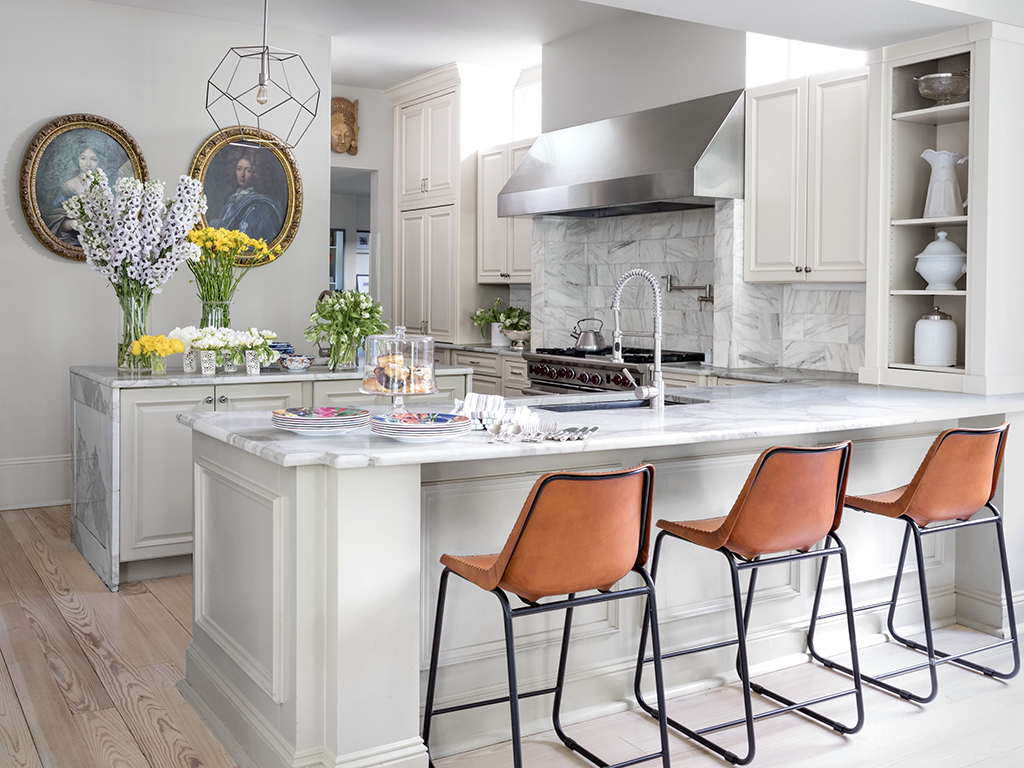 Luxury kitchen with marble island and stools