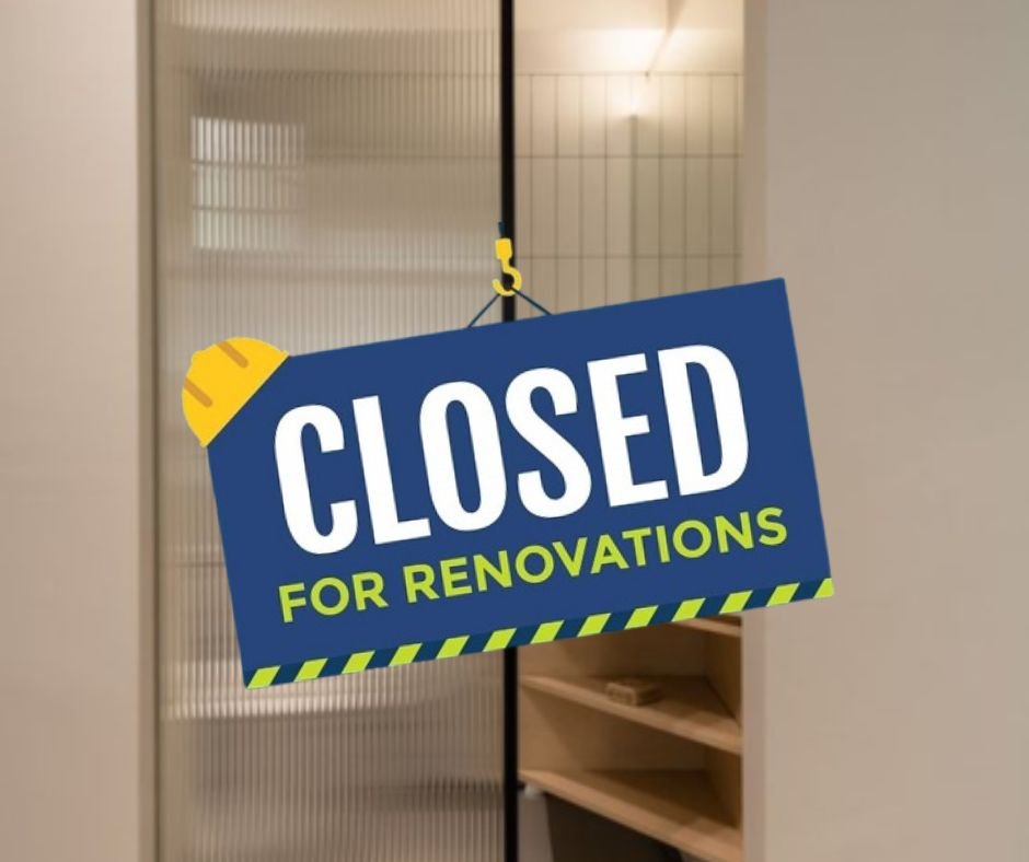 Renovation closure sign on door.